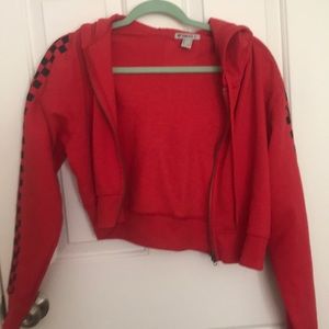 Red crop jacket with checker sleeves